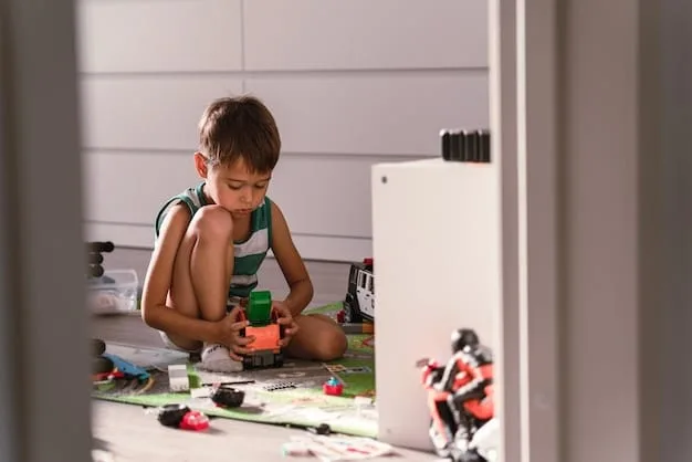 A child is sitting at a table, focused on assembling a robotics kit. The kit includes colorful wires, circuit boards, and various mechanical parts. The child's expression is one of intense concentration and excitement.