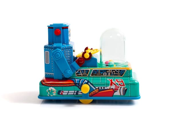A collection of various augmented reality toys, including a globe, a puzzle, and a building block set. Each toy is displayed with its corresponding AR application running on nearby tablets, showcasing the interactive and educational elements. The setting is a bright, modern classroom or playroom.