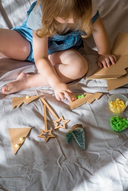 A close-up, lifestyle shot of a child happily playing with a set of wooden building blocks designed by an indie toy designer. The blocks are colorful and geometrically shaped, suggesting creative and educational play. The background is a warmly lit playroom, conveying a sense of organic, imaginative fun.