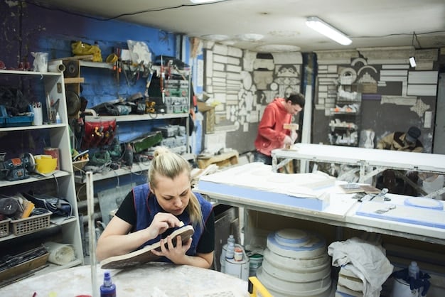 A workshop showing shelves filled with various 3D-printed toy prototypes. A person is sanding and finishing the surface of one of the prototypes to improve its smoothness and appearance before painting.