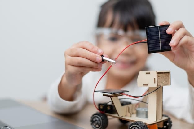 A close-up shot of a child's hands building a model car using a solar panel kit. The child is focused and smiling slightly, surrounded by various components of the kit. The background is softly blurred to highlight the hands and the project.