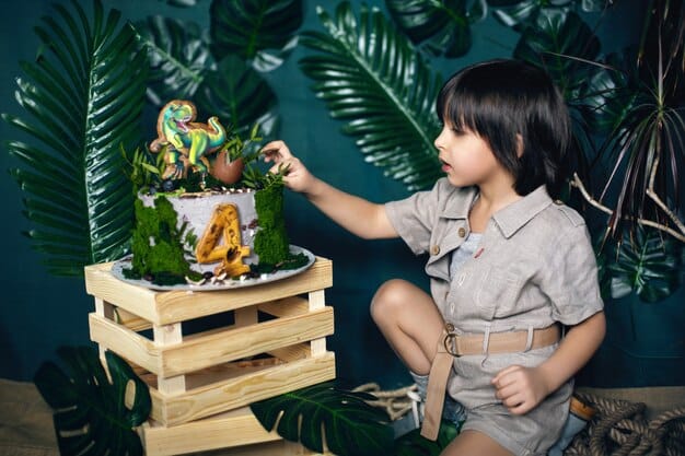 A child is holding a small, detailed dinosaur figurine in front of a tablet. The tablet screen shows the dinosaur coming to life in augmented reality, with detailed textures and animations, set against the backdrop of the child's living room.