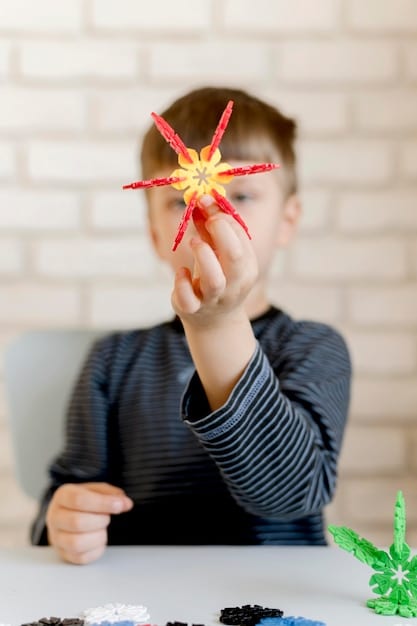 A close-up shot showcasing the hands of a child engrossed in assembling a science experiment from a subscription box, focusing on the child's engaged expression and the intriguing components of the kit.