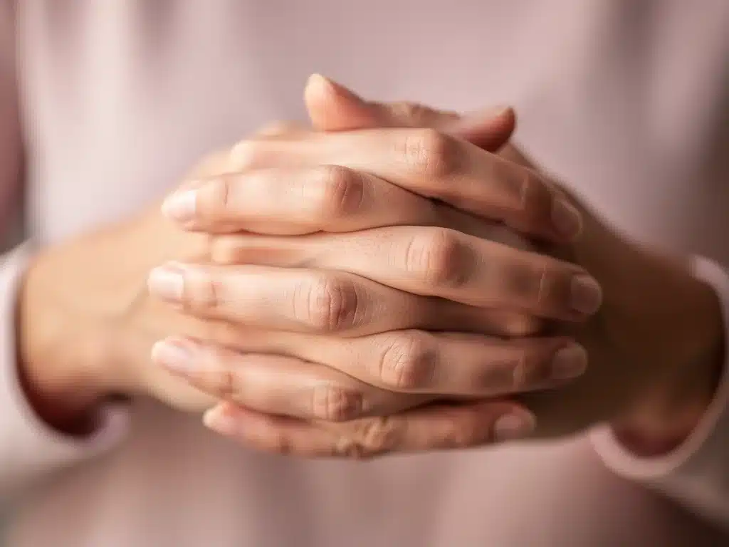 Hands in a comforting gesture, symbolizing self-soothing