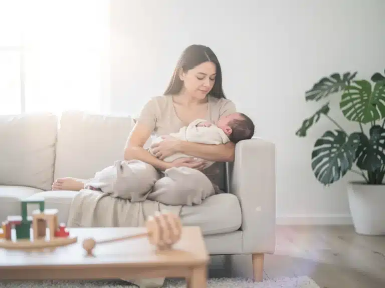 New mom and baby embracing sustainable living with eco-friendly products
